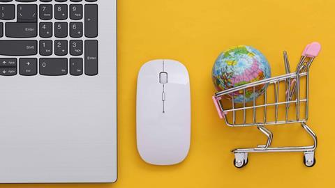Keyboard-mouse-shopping-trolley-and-globe