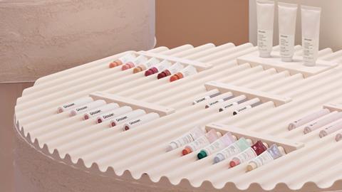 Interior of Glossier flagship in Manhattan showing products