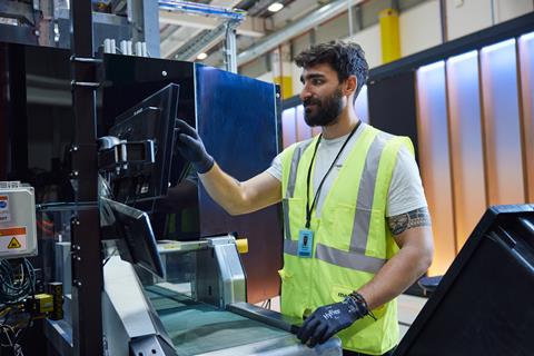 Amazon worker using the Universal Item Sorter