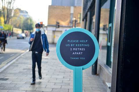 John Lewis social distancing sign