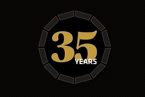 Gold text in a circle on a black background reading: '35 years'