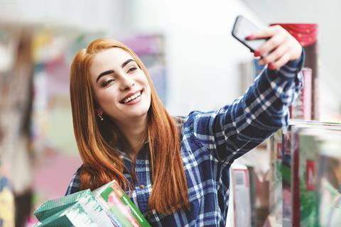 Woman making a selfie payment