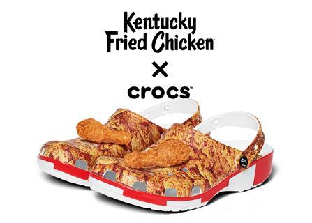 Promo shot showing the KFC x Crocs shoe collaboration with text saying: 'Kentucky Fried Chicken x Crocs'