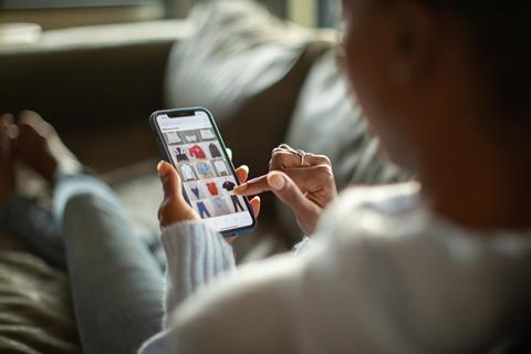 Person shopping on phone
