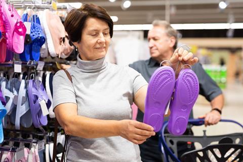 Over-50s-woman-and-man-shoe-shopping