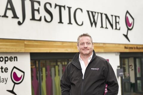 John Colley, CEO of Majestic Wine outside a store