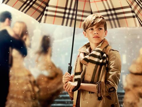 Romeo Beckham dressed in Burberry