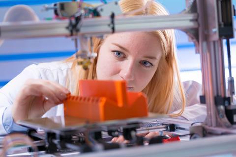 Woman scientist 3 d printing credit shutterstock