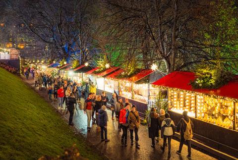 Shoppers in an outdoor Christmas market