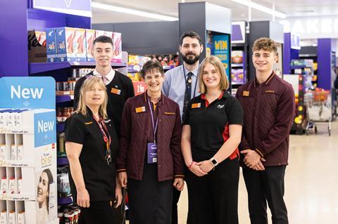 Group of Sainsbury's staff in store