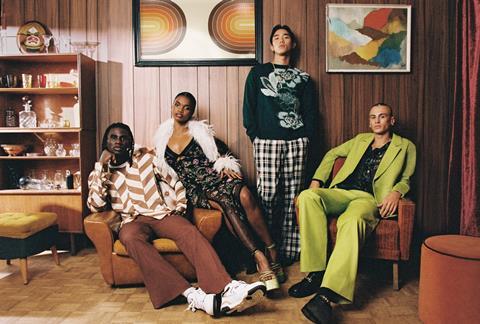 Four Asos models posing in stylised room