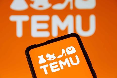 Temu-logo-on-phone-screen-with-Temu-logo-in-background
