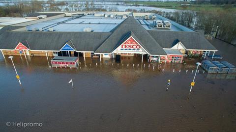 Aerial photographs of a Tesco Extra store in Cumbria showed the extent of the flooding in the North West.