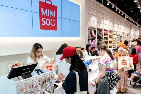 Customers at Miniso checkout