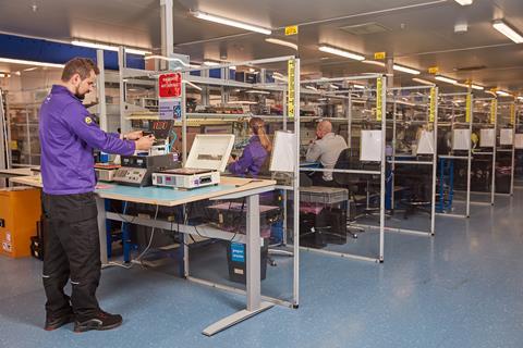 Experts working at Currys repair centre in Newark