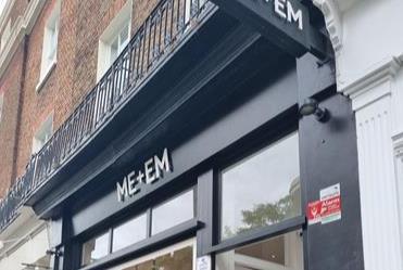 Me + Em store sign