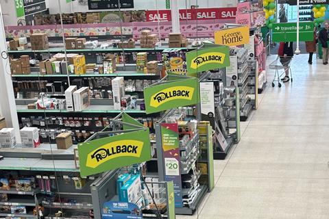 Asda Rollback sings on display in supermarket
