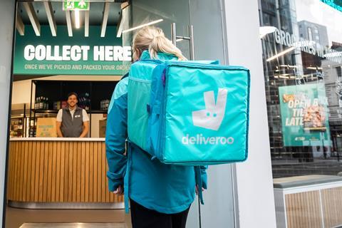 Driver collecting order at Deliveroo Hop store