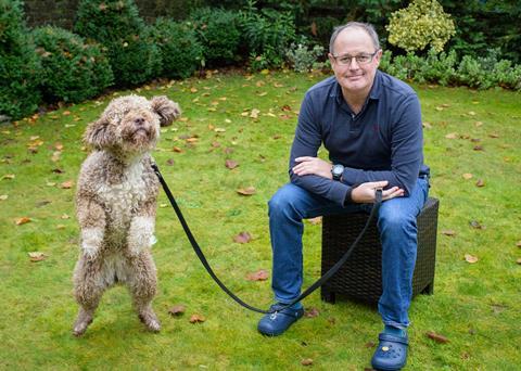 Graham Coxell with his pet poodle