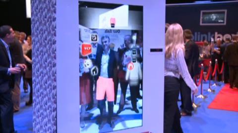 Tesco chief information officer Mike McNamara tests out the virtual fitting room mirror