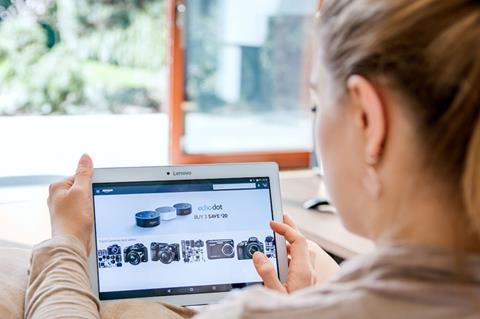 woman shopping on her tablet