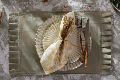 Styled Primark homewares image showing place setting and cutlery