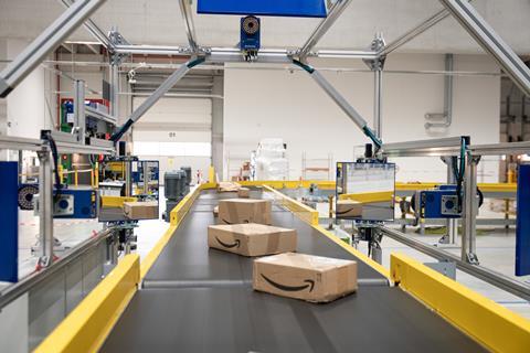 Parcel on conveyor belt in Amazon delivery station of the future