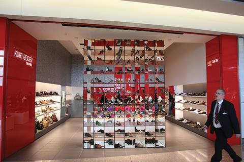 Kurt Geiger says high rates and rents deter it from expanding in the UK