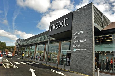 Next sales surged 10.8 per cent in its first quarter pushing full-year profit growth forecasts up 3 per cent.