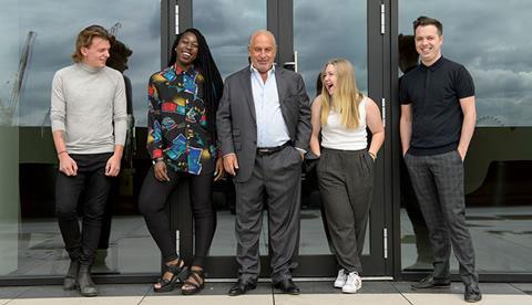 Sir Philip Green with students from the Fashion Retail Academy