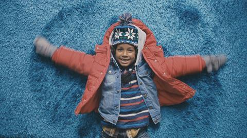 Argos' TV ad features a series of ‘real life’ scenes including a child making snow angels in a deep pile rug