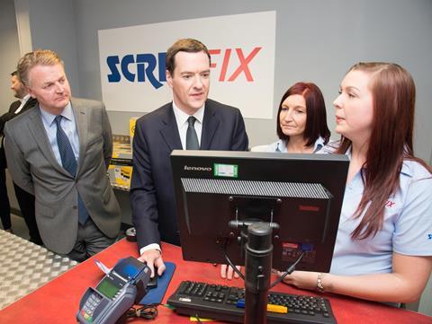 George Osborne with Screwfix boss Andrew Livingston at the Cannock store