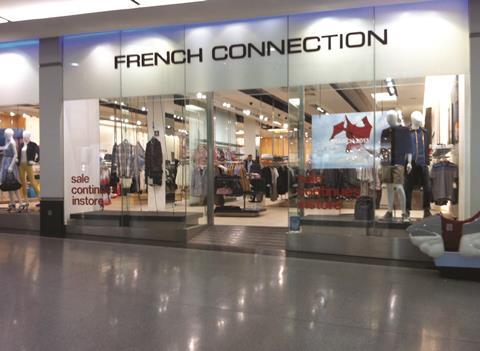 French Connection Group has reported smaller losses for the year as it continues it turnaround plan, driven by growth in its wholesale division and increased licensing income.