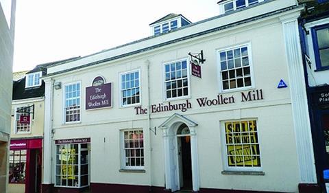 Edinburgh Woollen Mill has unveiled a rise in group profits as it plots 100 store openings in the next two years.