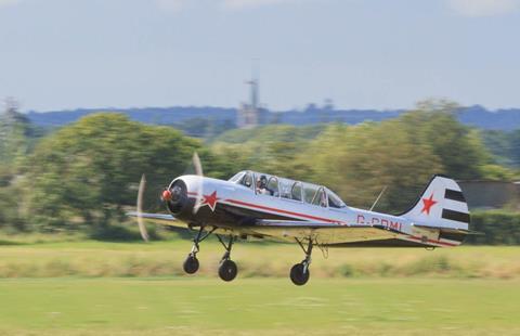 Kingfisher group communications director Ian Harding in his stunt plane.