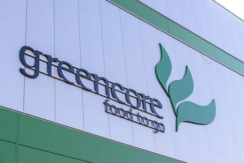 Greencore sign on side of building, which reads: 'Greencore – food to go'