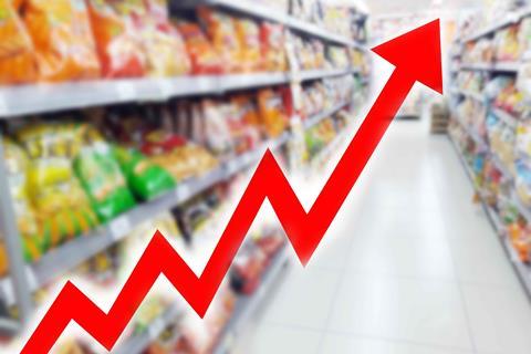 Grocery shelves with a red arrow pointing up over the top