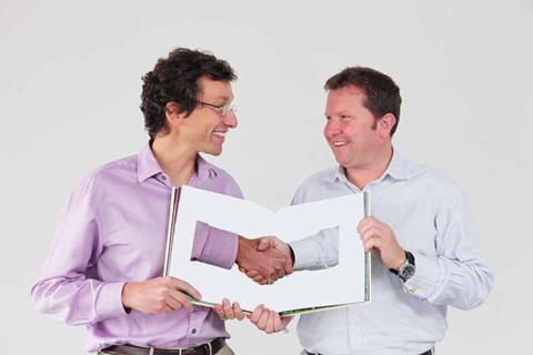 Photobox’s Stan Laurent and Moonpig’s Nick Jenkins shake on the deal