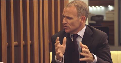 Tesco boss Dave Lewis has purchased a stake in the retailer, 24 hours after revealing the board had imposed a ban on trading shares.